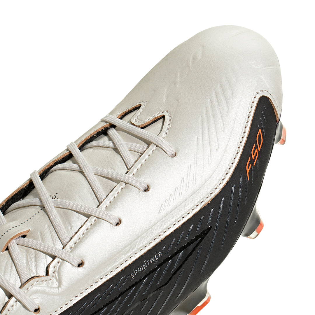 F50 Elite Hyperfast FG L - Tech - Zero Metallic / Core Black / Solar Orange