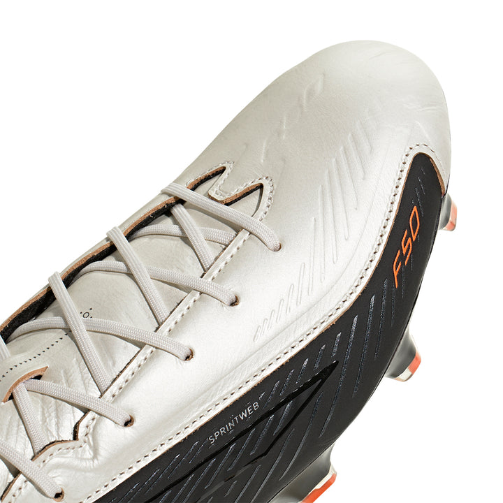 F50 Elite Hyperfast FG L - Tech - Zero Metallic / Core Black / Solar Orange